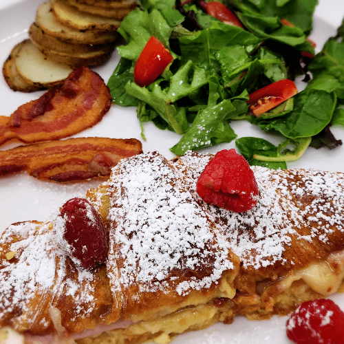 Image of Croissant Monte Cristo with bacon, potatoes and Salad