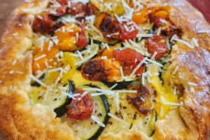 Port_Austin_Bed_and_Breakfast_Port_Austin_Michigan_Hotel_Image 16 - Port Austin Bed & Breakfast Breakfast pie with roasted zucchini and tomatoes