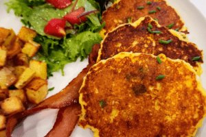 Port_Austin_Bed_and_Breakfast_Port_Austin_Michigan_Hotel_Image 8 - Port Austin Bed & Breakfast Corn fritter pancakes, bacon, potatoes and salad